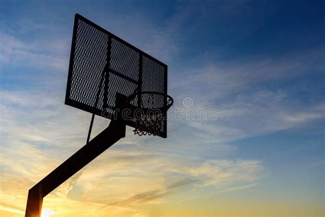 Basketball Hoop On Sunset Sky Stock Photo Image Of Play Space 164333574
