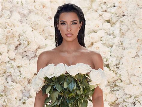 Kim kardashian wedding dresses by vera wang. Kim Kardashian Is Walking Bouquet Of Flowers In Baffling ...