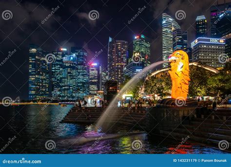 Light Up And Laser Show At Night With Urban Cityscape In Merlion Park