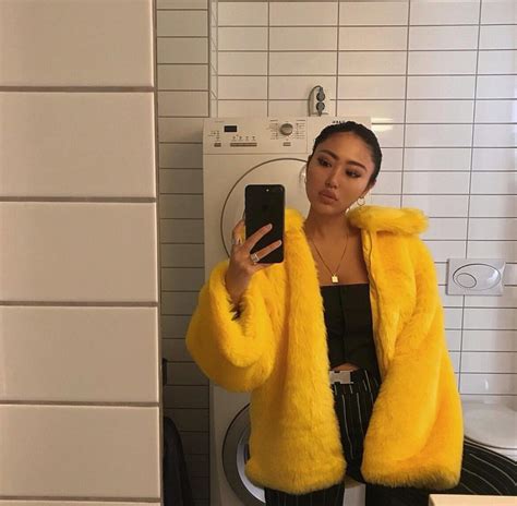 Fuzzy Yellow Coat And Black Trousers And Bandeau Edgy Fashion Outfit