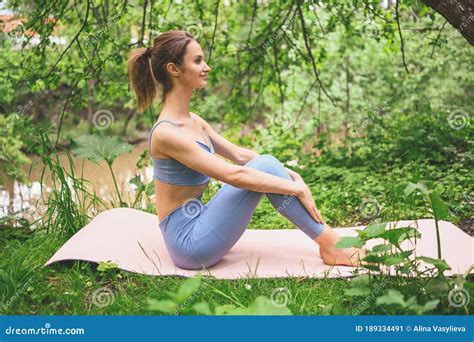 Beautiful Fit Woman In Sportswear Doing Exercises On Pink Yoga Mat Muscular Slim Attractive