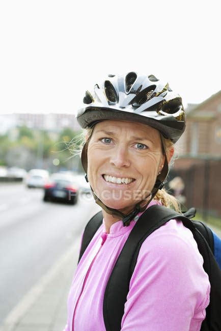 Portrait Of Woman Wearing Bicycle Helmet — One Toothy Smile Stock