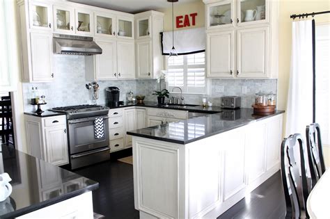 Use accent colors in traditional. Kitchen white cabinets dark countertops - give your ...
