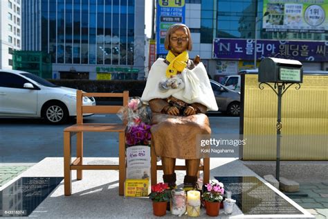 The Statue Of A Girl Symbolizing Comfort Women Is Seen In Front Of News Photo Getty Images
