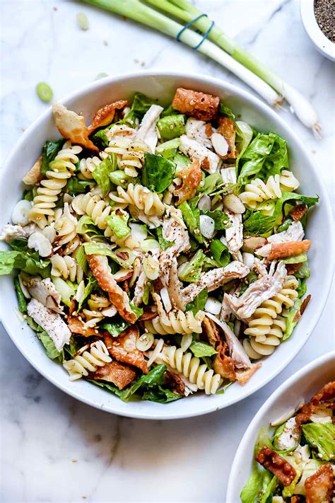 This easy chinese chicken salad gets tossed with a bright, gingery dressing and topped with crunchy noodles. Chinese Chicken Salad with Sesame Dressing | Foodiecrush.com