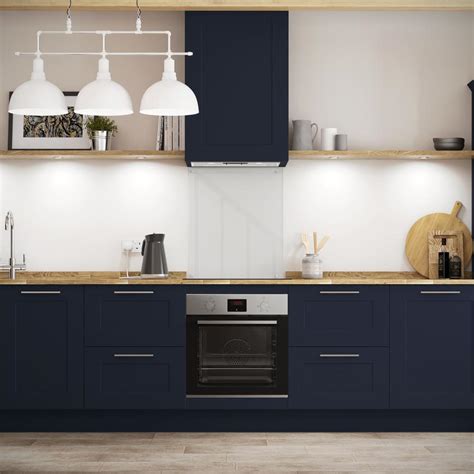 Chrome effect angled bar handles and basalt slate. Chelford Navy Kitchen | Fitted Kitchens | Howdens