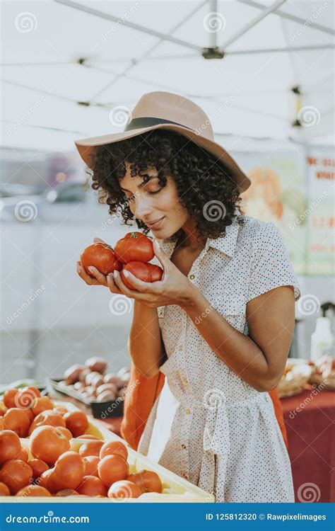 Woman Buying Tomatoes At A Farmers Market Stock Photo Image Of