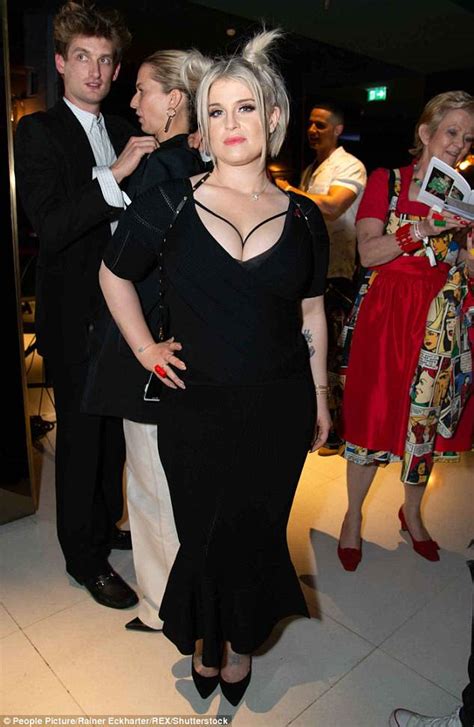 Kelly Osbourne Puts On A Very Busty Display In A Curve Hugging Peplum