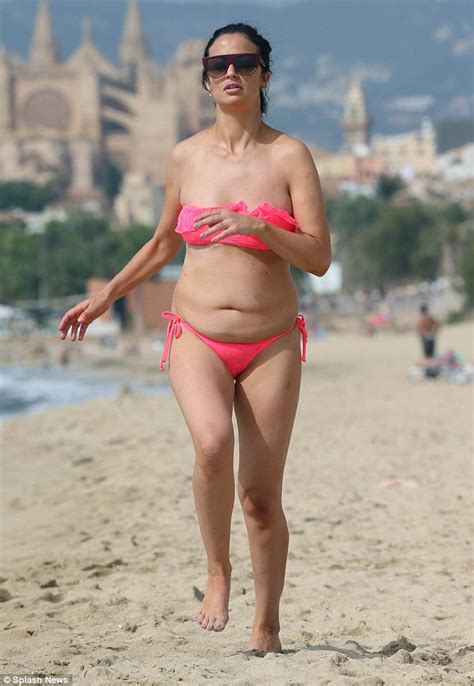 Chantelle Houghton Displays Her Figure As She Relaxes On The Beach In