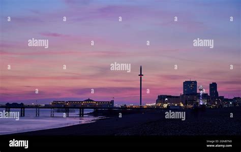 Sunset Over Brighton Pier Stock Photo Alamy