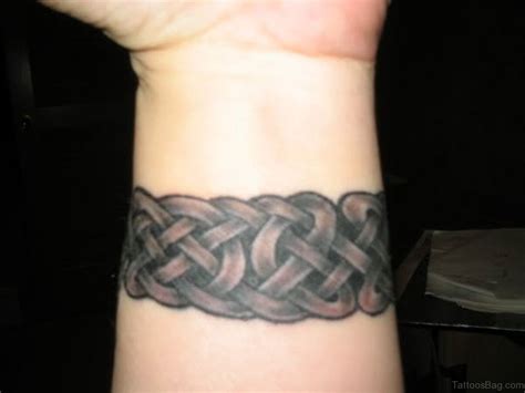 These bracelet tattoos are done most of the time round on wrist with a structure of bracelet shape. 46 Amusing Arm Band Tattoos On Wrist