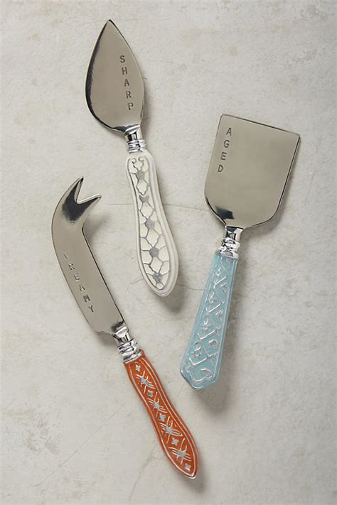 Aldana is a contemporary shaker style door. Aldana Cheese Knives | Anthropologie