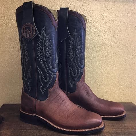 Handmade Cowboy Boot With Black Uppers Mule Ears And Bison Vamps