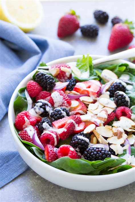 Boiled fingerling potatoes are served with spinach, mint leaves, and salmon in this hearty salad recipe that's apt for lunch or dinner. Triple Berry Spinach Salad