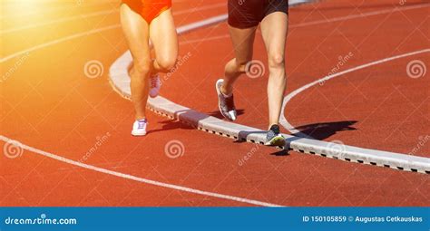 Close Up Of Runners Feet On The Track Field Stock Image Image Of