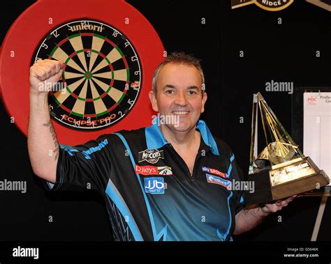 Phil Taylor With The Mccoys Premier League Darts Trophy During The Pdc