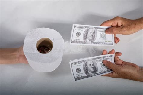 Close Up Sell Buy Tissue Hand Holds Toilet Paper Tissue And Money Of