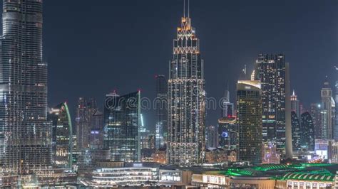 Aerial Nighttime Cityscape With Illuminated Architecture Of Dubai