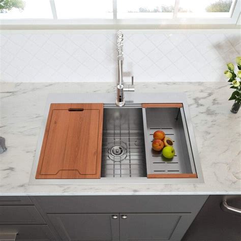 This kitchen sink style is structured to be dropped into an opening in counter top. Dcolora 25" Stainless Steel Drop In Ledge Workstation ...