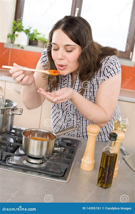 Cook Plus Size Woman Tasting Tomato Sauce Stock Image Image Of Plus
