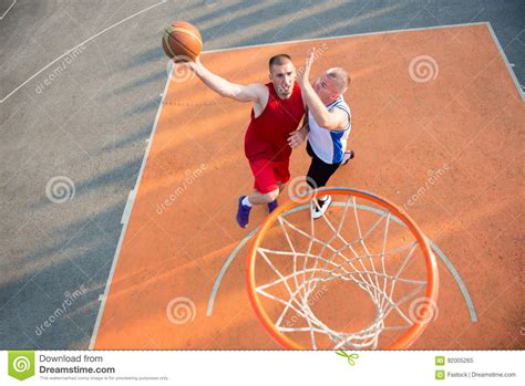 Two Basketball Players On The Court Outdoor Stock Image Image Of