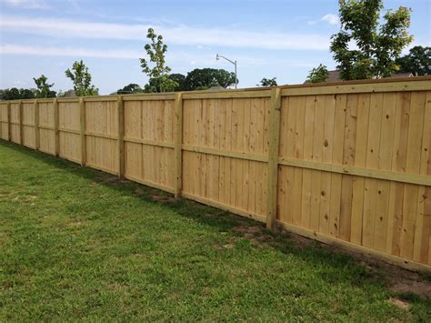 Wood fences don't always have to enclose something. wood fences : Liberty Fence and Deck