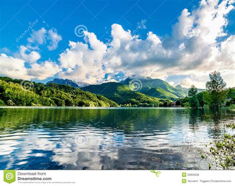 Summer Mountains Lake Landscape Over Blue Sky Before