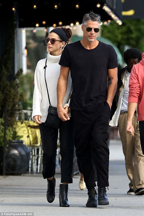 Sandra Bullock And Boyfriend Bryan Randall Lock Hands During Romantic