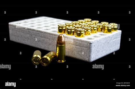 Some 9mm Bullets Isolated In A White Box Stock Photo Alamy