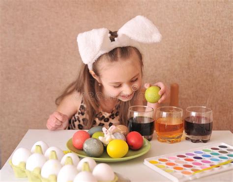 Little Girl Painting Easter Eggs At Home Stock Image Image Of