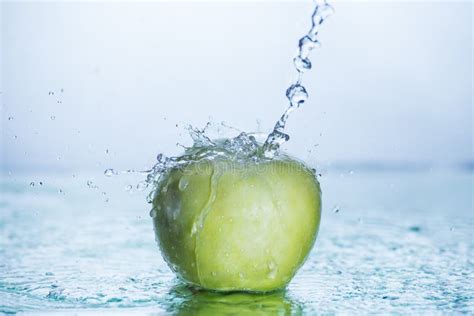 Green Apple With Freezed Water Splash Stock Photo Image Of Apple