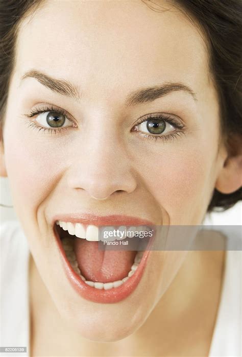 Young Woman Laughing Mouth Wide Open Photo Getty Images
