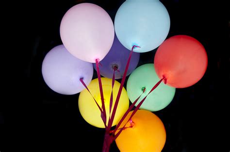 Free Image Of Colorful Balloons On Laces Isolated On Black Freebie