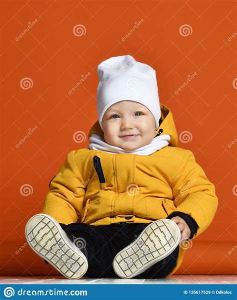 Children In Winter Clothes Kids In Down Jackets Stock Image Image Of