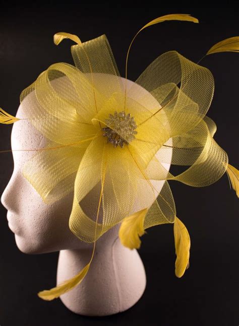 yellow feather and crinoline fascinator by belledebenoir on etsy 45 00 yellow feathers