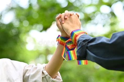 Gay Couple Wearing Rainbow Awareness Wristbands Holding Hands Lgbtq Community Freedom