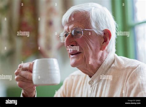 Older Caucasian Man Drinking Coffee Stock Photo Alamy