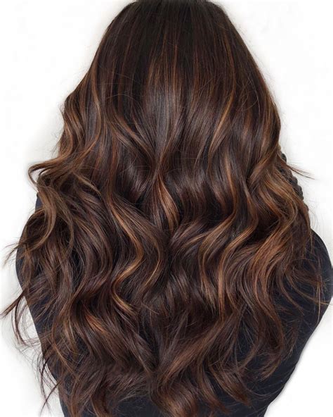 I have dark brown hair, and on thursday i went to the salon and had caramel highlights put in my hair. Coolest Ideas About Dark Brown Hair With Caramel ...