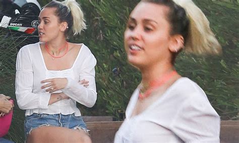 Miley Cyrus Flashes Her Legs In Cutoffs As She Skips Vmas