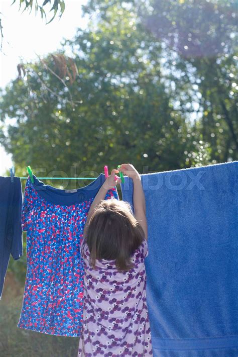Young Girl Hanging Washing Stock Image Colourbox