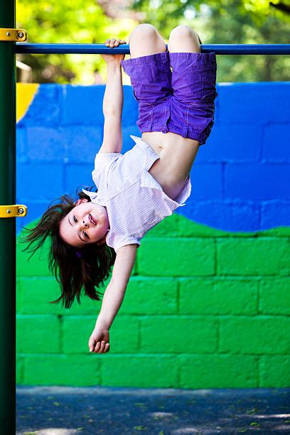 Royalty Free Girls Hanging Upside Down Pictures Images And Stock