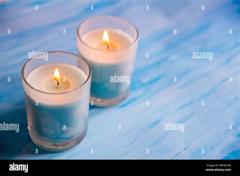 Two Lit Up Candles Stock Photo Alamy