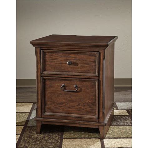 Susan, purchased on december 1, 2020. H478-42 Ashley Furniture Woodboro - Brown Lateral File Cabinet