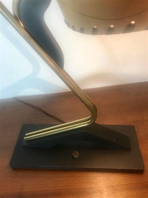 The majestic lamp company was a spin off of an older manufacturer of radios and lamps after the end of world war ii. Unusual Mid-Century Modern Table Lamp by Majestic Lamp, Original Atomic Shades For Sale at 1stdibs