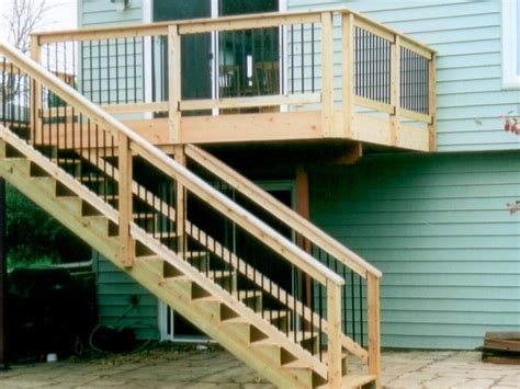 Wooden outdoor handrails add a rustic, classy and elegant look to any home. wood on top and sides of rail | Deck stair railing, Exterior stairs, Deck stairs