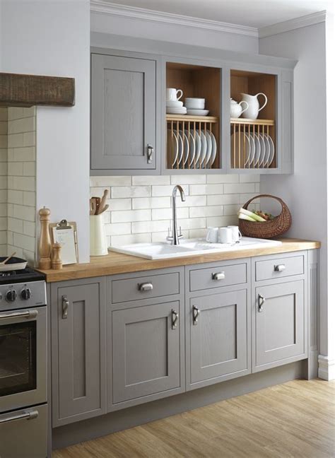 We believe that human touch is crucial for joining wood and making it into beautiful furniture. 30 Grey Kitchens That You'll Never Want To Leave - DigsDigs