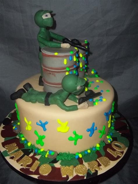 We made our own paintball field using plyboard as walls and we planted a flag (a mop stick with a pillowcase) in the middle, for kids to get to. Paintball cake - cake by Willene Clair Venter - CakesDecor