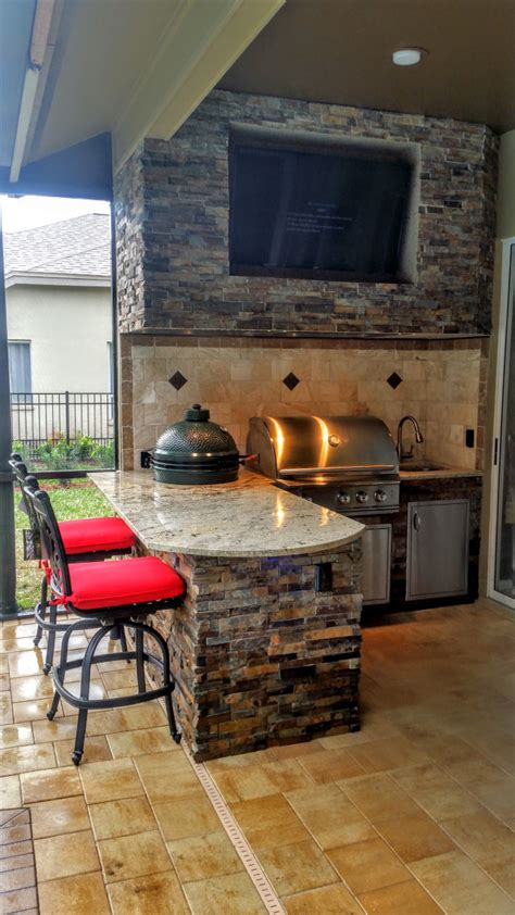 Granite And Stonework Outdoor Kitchen With Entertainment Creative