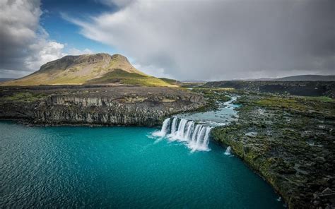 Download Wallpaper Waterfall Lake Mountains Iceland 1920x1200