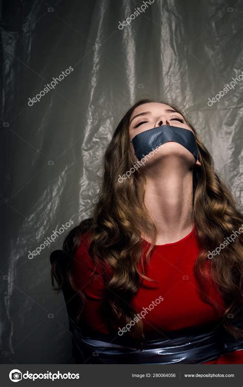 A Beautiful Girl With A Gag In Her Mouth As A Symbol Of Censorship